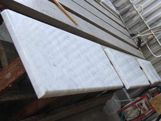 Manufacture of marble window sills Bianco Carrara, Italy.  =>Following