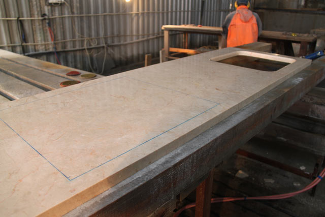 Manufacturing of a table-top from beige Turkish marble  =>Following