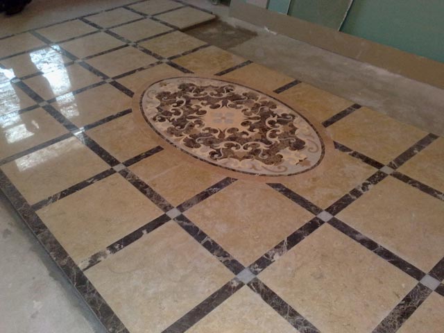 Floors with mosaic drawing and a decorative panel from marble Crema Nuova, Turkey and Imperador Dark, Spain  =>Following