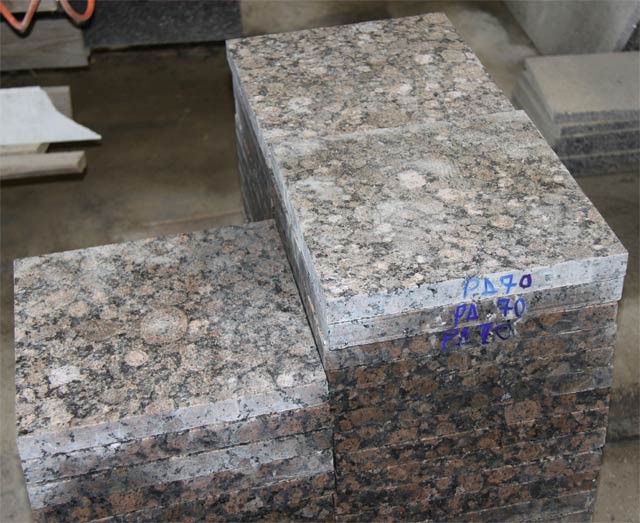 The thermoprocessed granite tile Baltik Brown in the size 300х300х30 and 300х600х30 mm.  =>Following