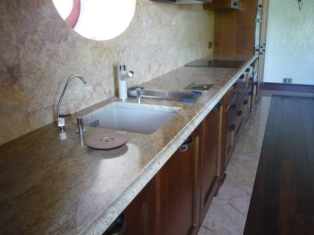 Table-top kitchen from granite Imperial Gold, India and the panel from marble Crema Valencia, Spain  =>Following