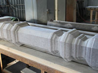 Fabrication of a hewn baluster from gray granite of the Surtas field