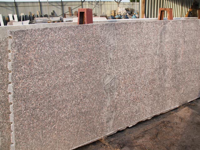 Slabs thermoprocessed a granite Dymovsky (deposit Baltic)  =>Following