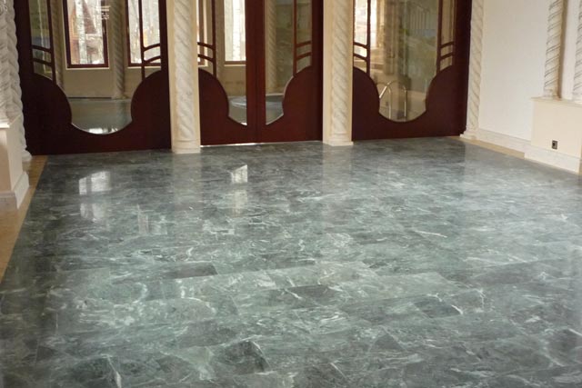 Facing of a floor by marble.  =>Following