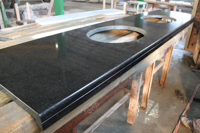 Table-top in a bathroom from granite Absolute Black India  =>Following